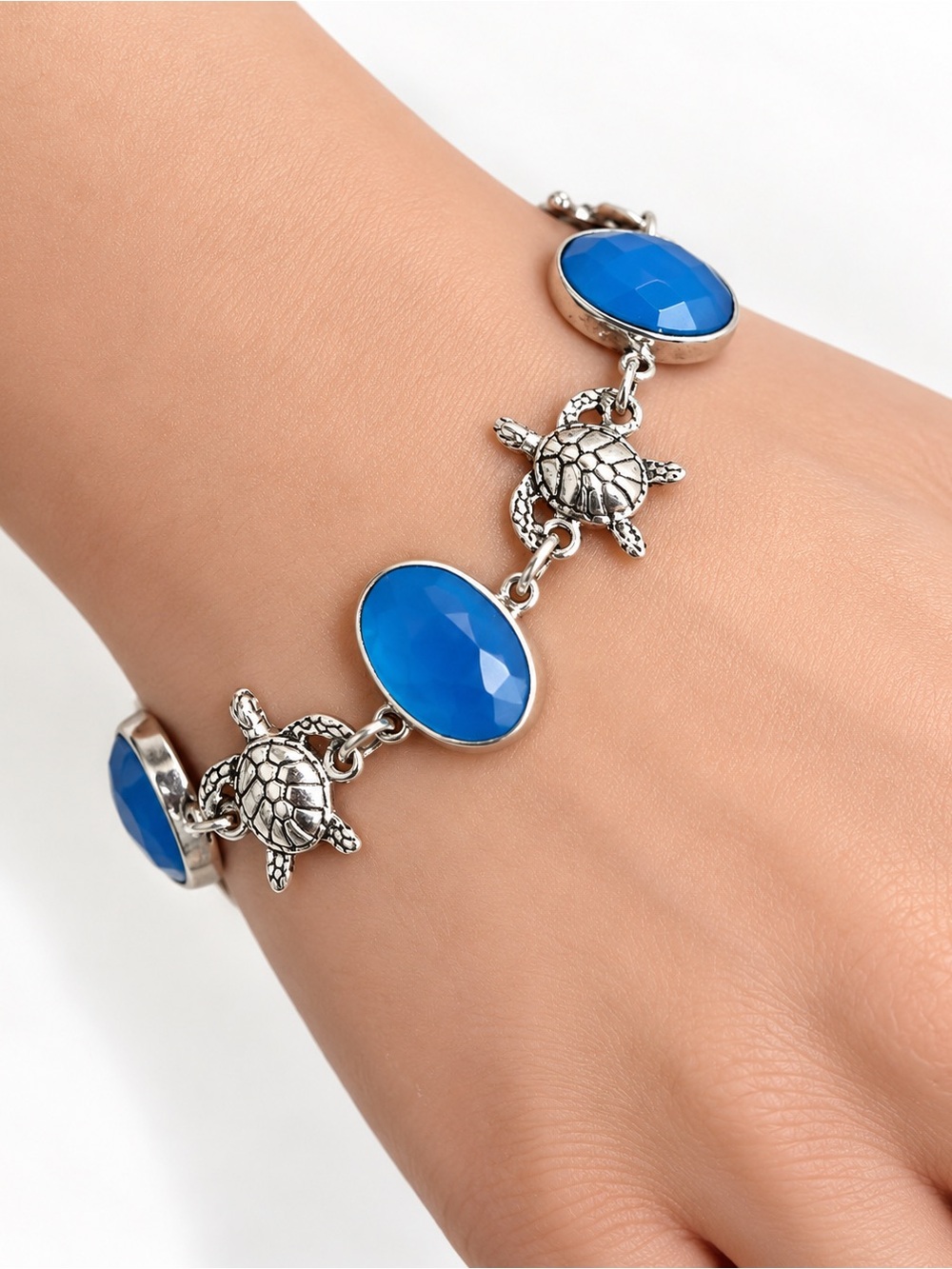 Sterling Silver Turtle Charm Bracelet with Blue Stones